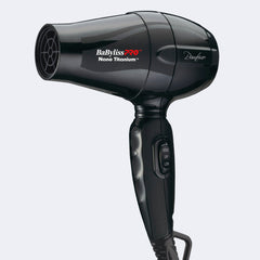 Black BaBylissPRO Nano Titanium hair dryer on a light gray background
